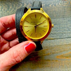 Michael Kors double wrap black band watch. Needs new battery. Band worn.
